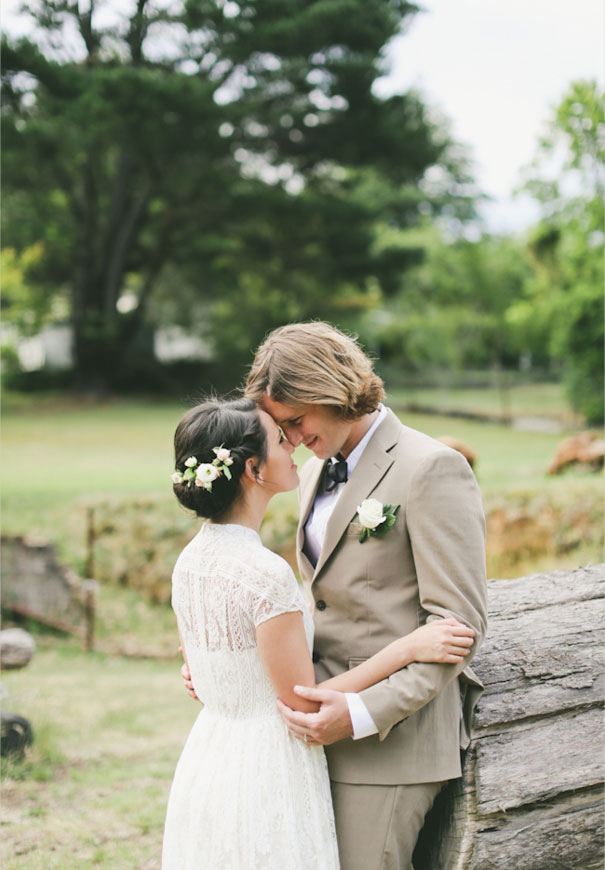 lara-hotz-country-wedding-inspiration-lace-lover-wedding-dress-bridal-gown-braids-hair-flowers-bowtie3