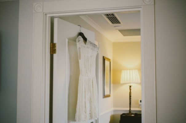 photographer-lara-hotz-country-wedding-inspiration-lace-lover-wedding-dress-bridal-gown-braids-hair-flowers-bowtie