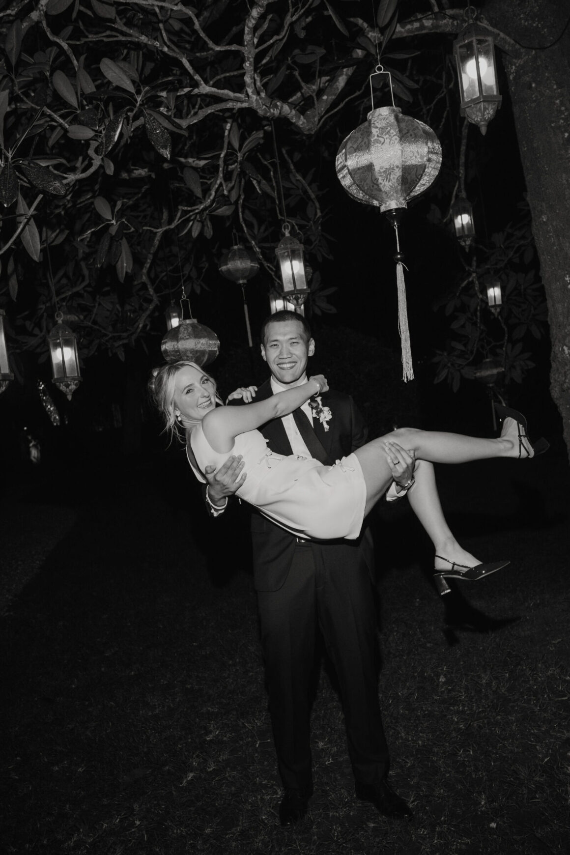 Anna and Jacky first dance under red lanterns at Gabbinbar, Toowoomba wedding.