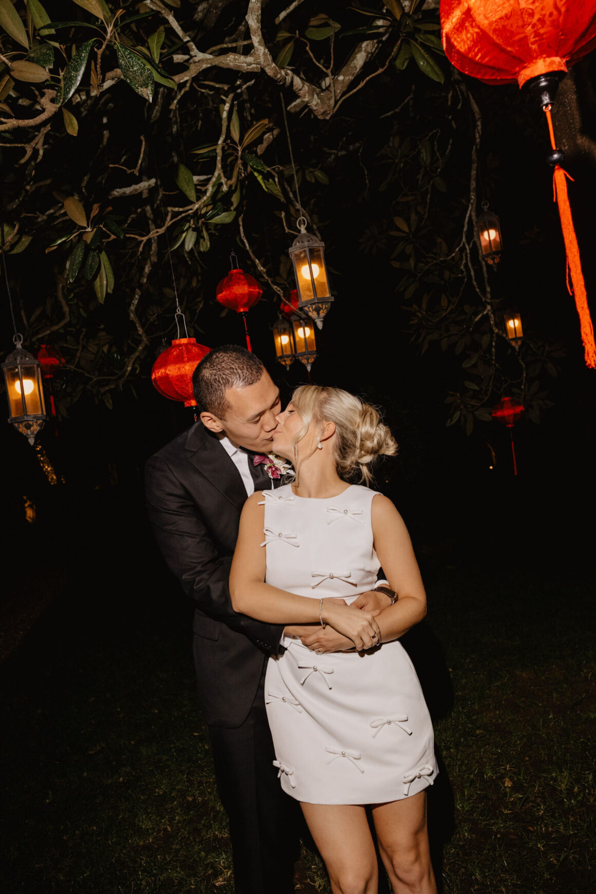 Anna and Jacky first dance under red lanterns at Gabbinbar, Toowoomba wedding.
