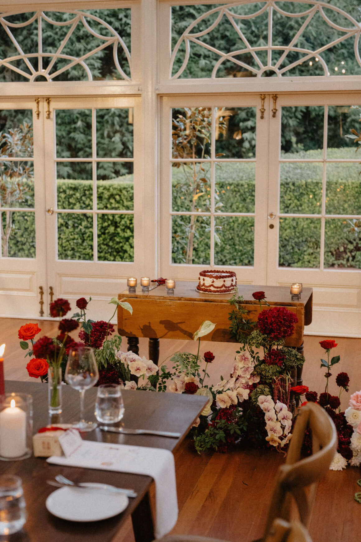Red and white wedding cake at Anna and Jacky’s Gabbinbar wedding