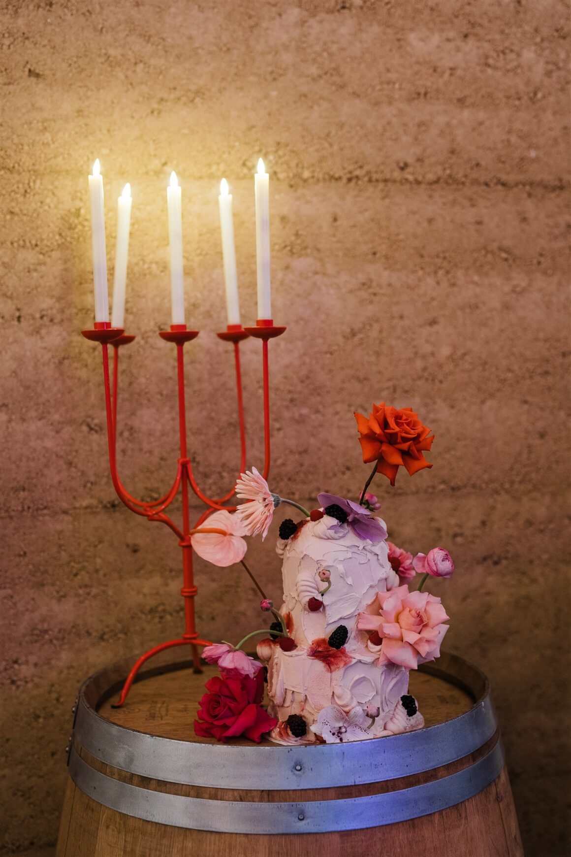 pink wedding cake with florals