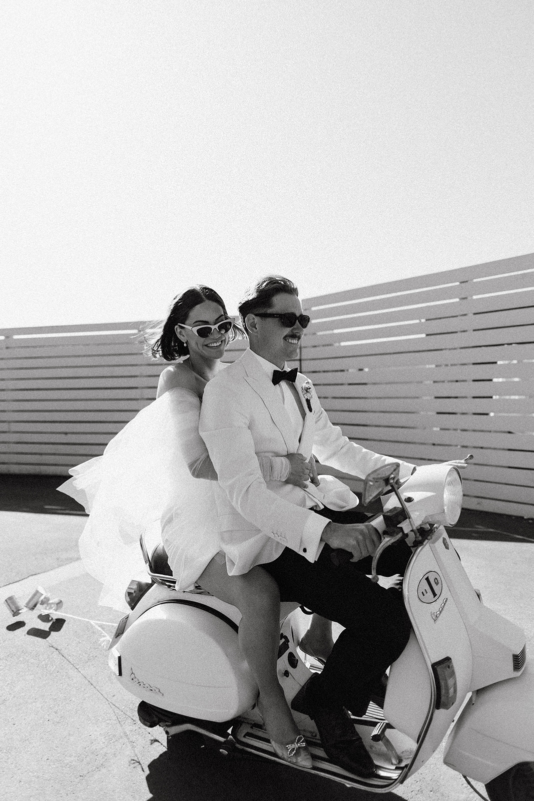 bride and groom on Vespa