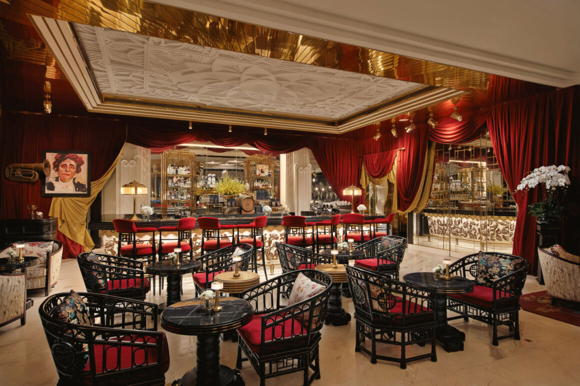 Stylish hotel room at Capella Hanoi blending vintage glamour with modern luxury