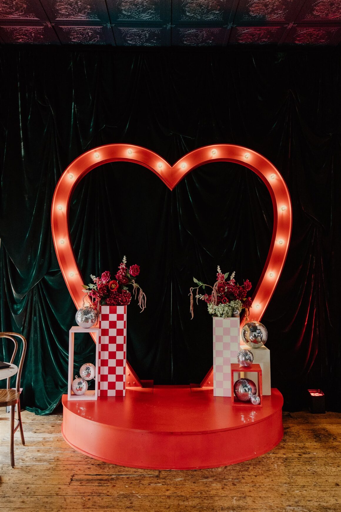Cherry Bomb Chapel interior with neon lights and retro wedding styling