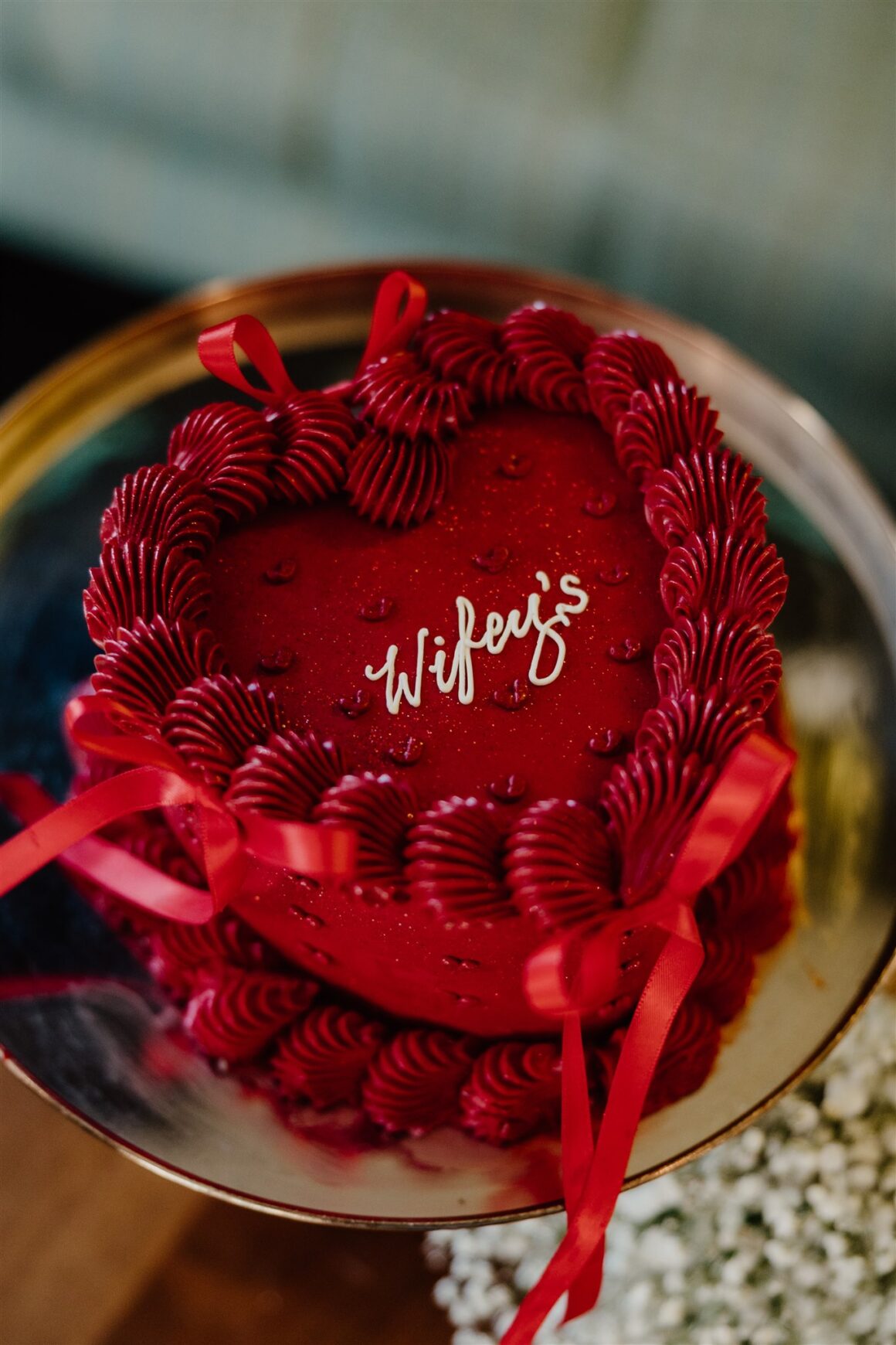 All-red modern wedding cake at quirky Perth elopement