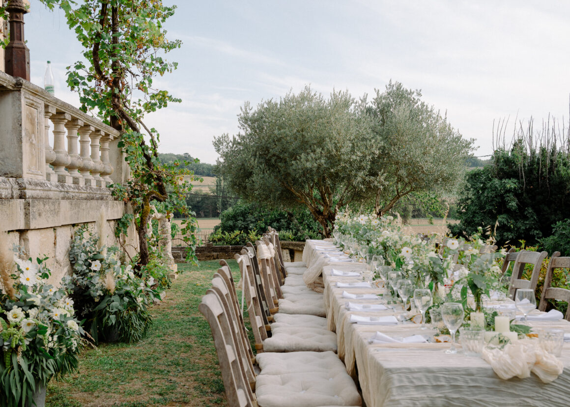 hic garden party wedding styling with ivory candles and draped tables