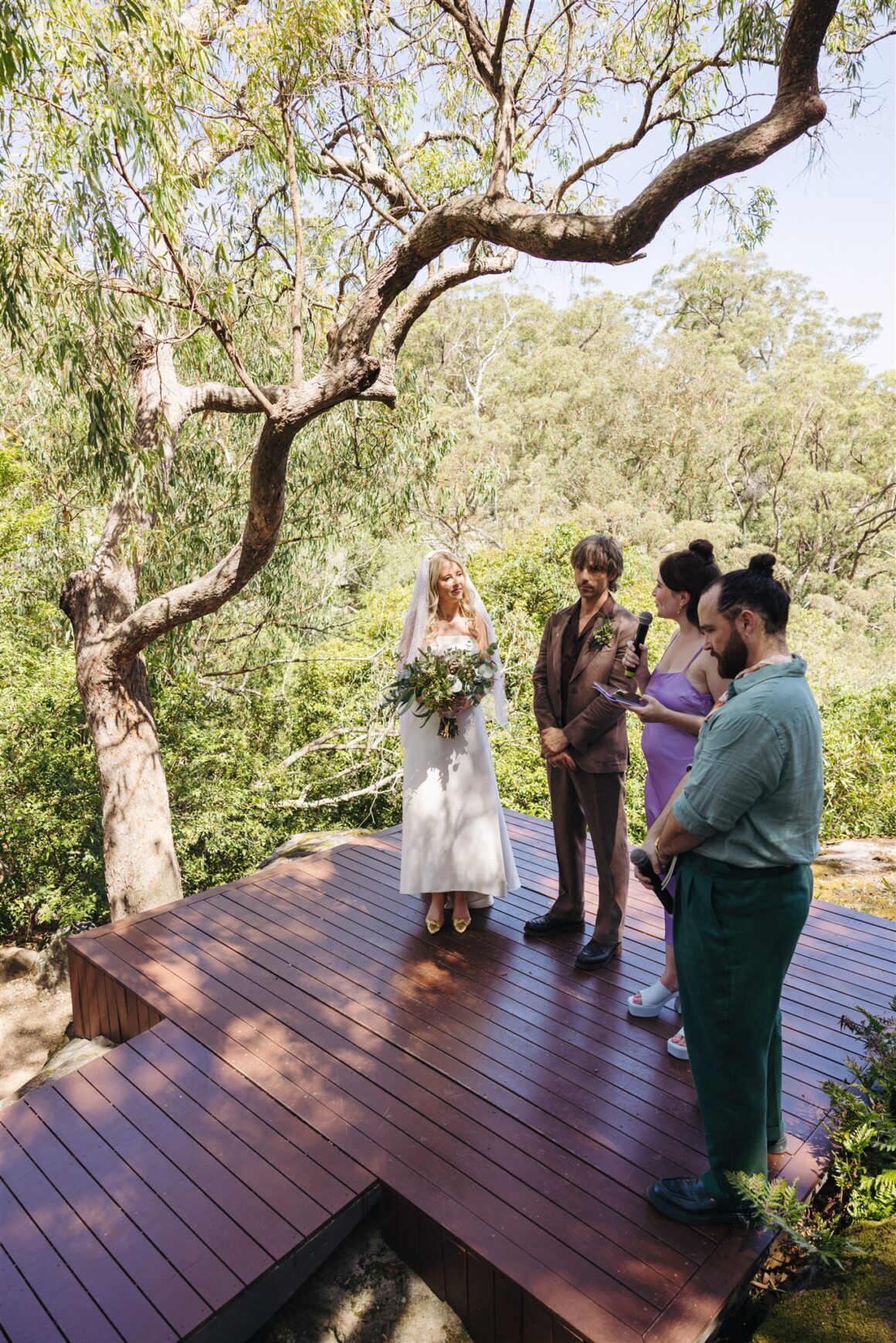 Bride and groom exchanging vows at Wildwood wedding venue