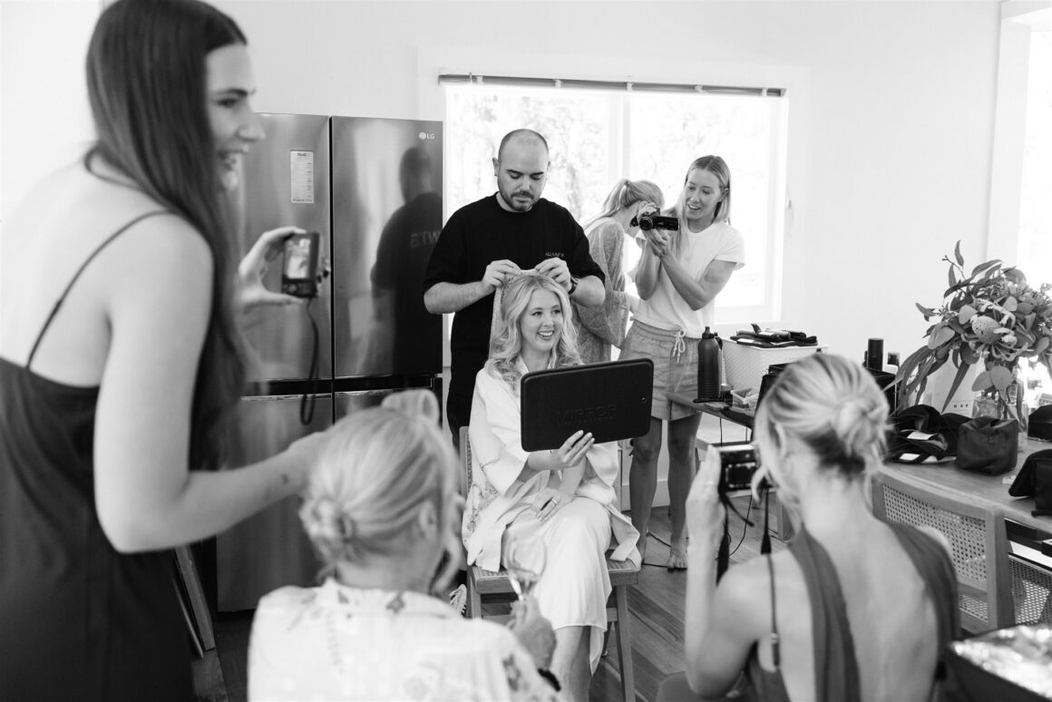 Bride getting ready with bridesmaids at Wildwood House