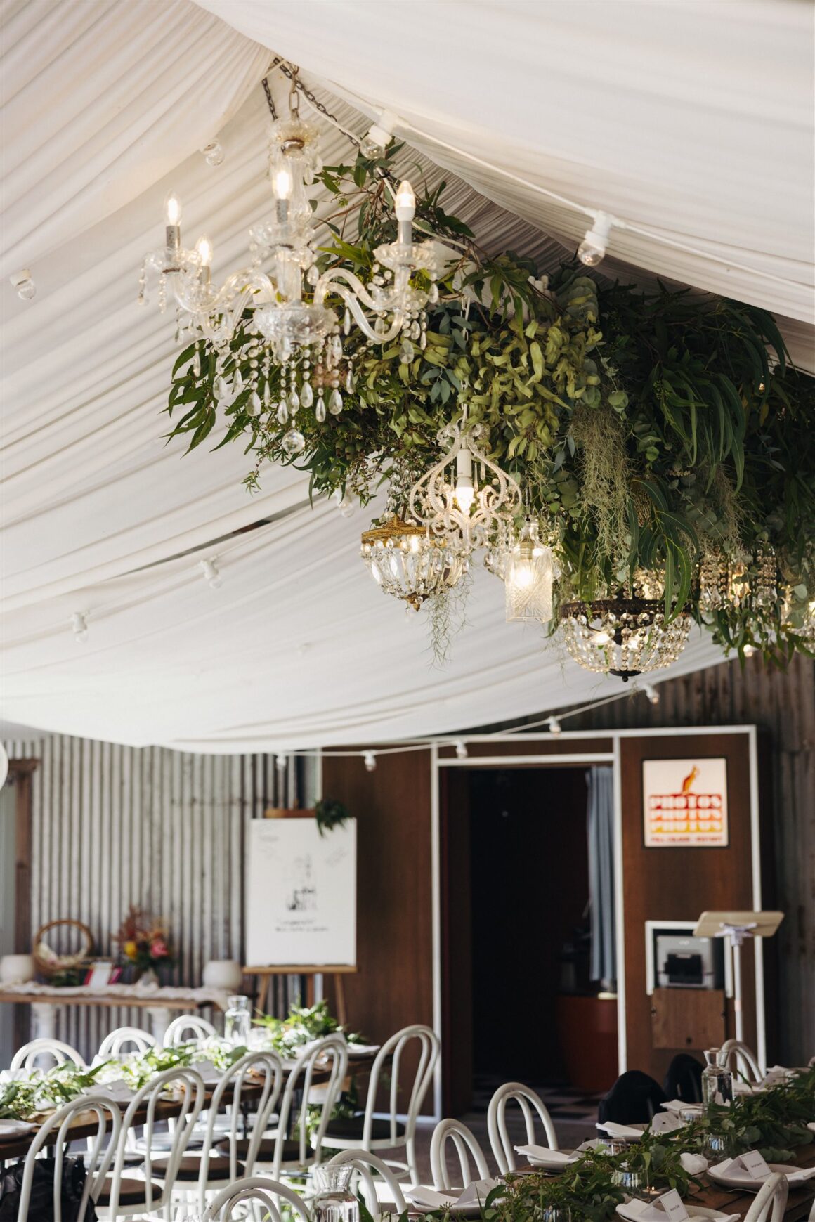 Natural wedding reception styling with native greenery