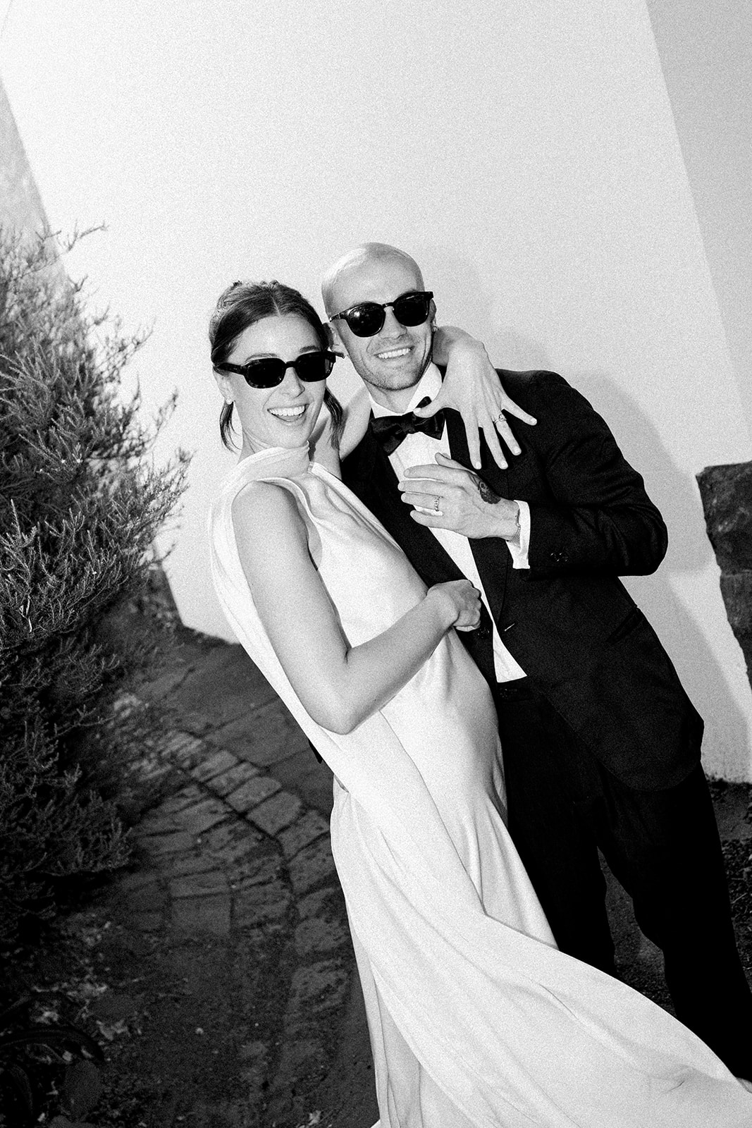 Bride in a silk Cortana gown and groom in P. Johnson and M.J. Bale at their Half Acre restaurant wedding in South Melbourne