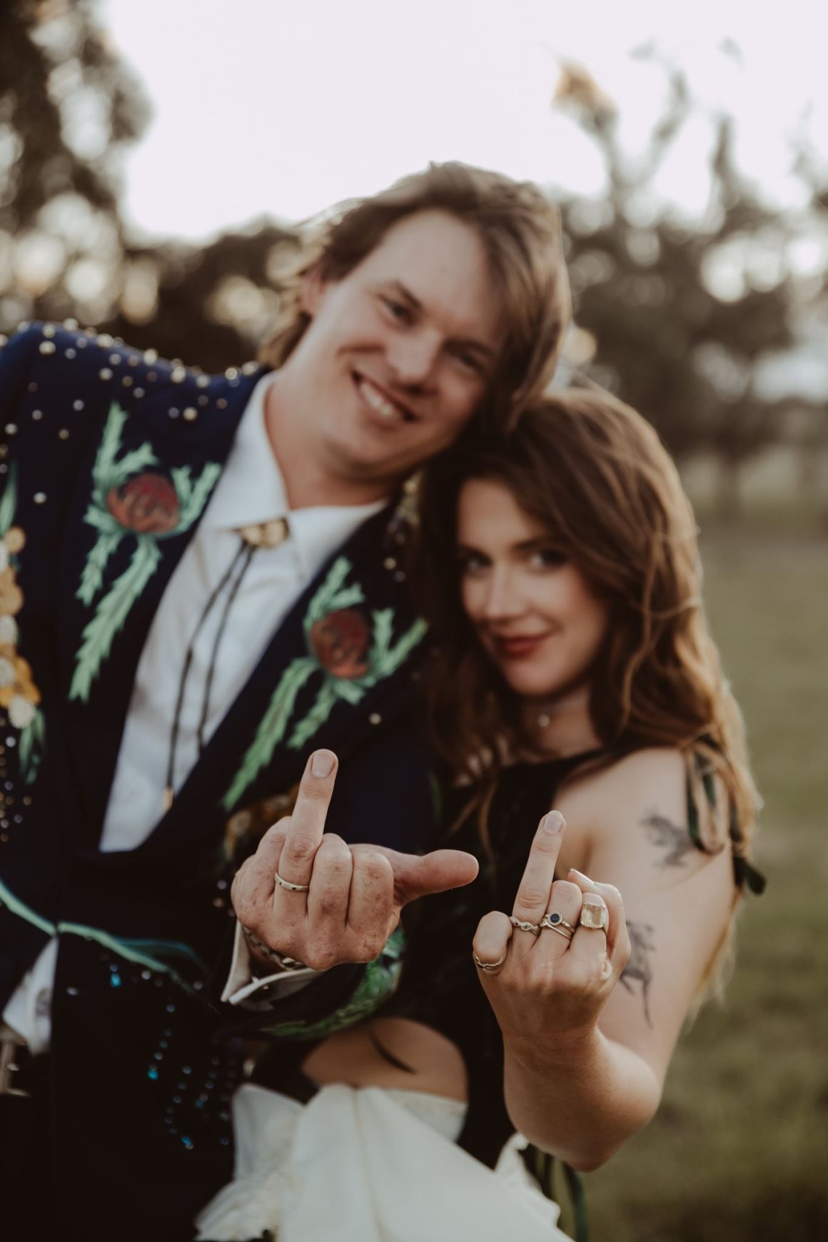 Fred and Zoë embracing on their wedding day at Majura Valley Farm in Canberra